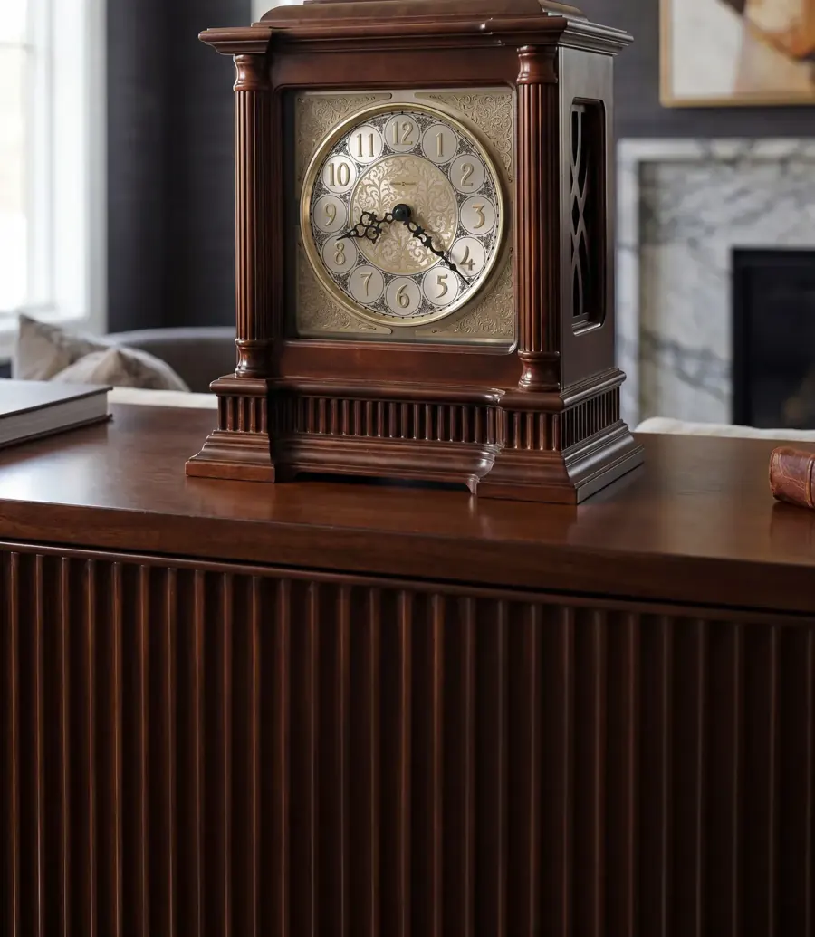 Mantel clock styled in a layered interior